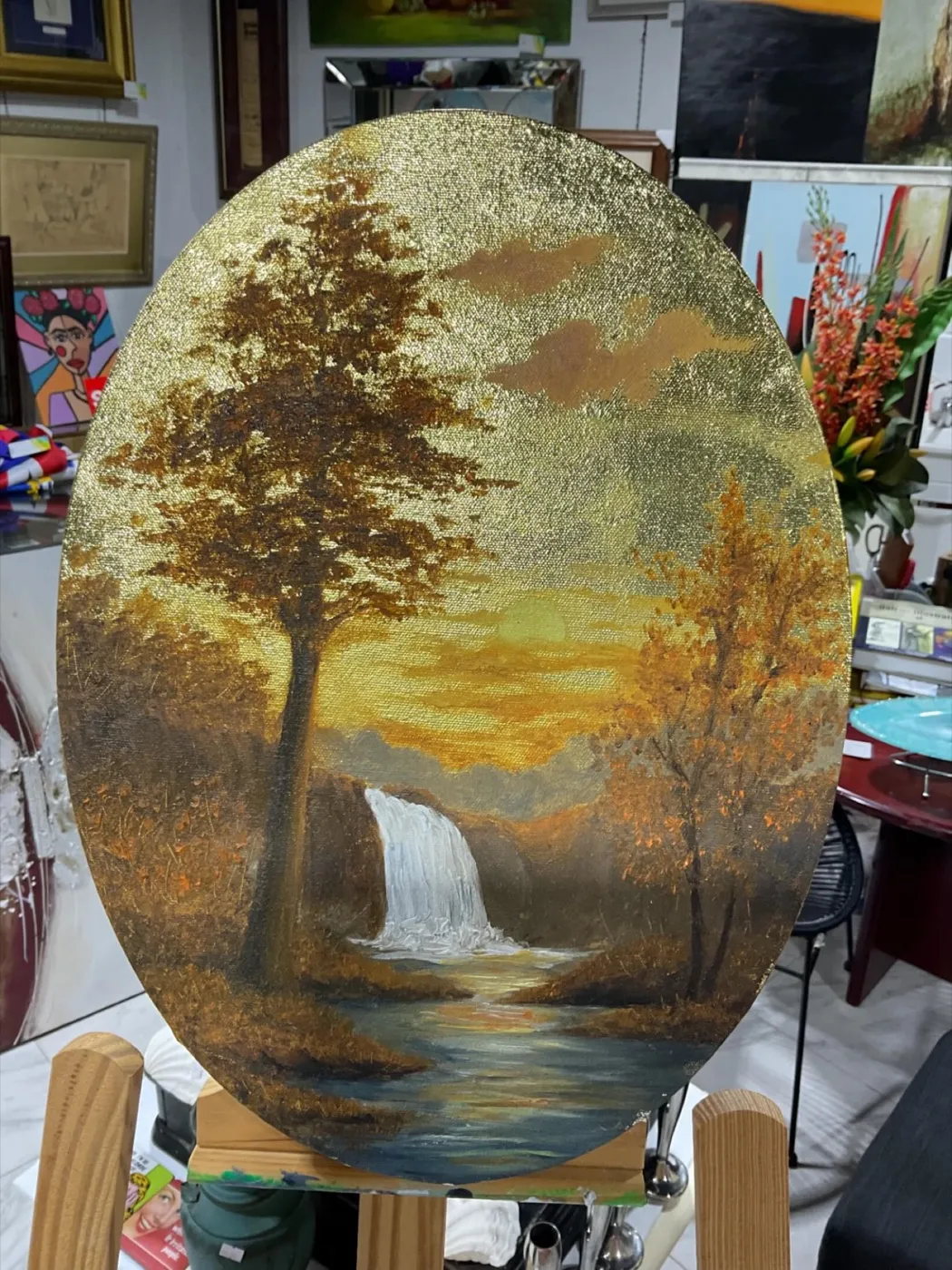 Oval waterfall painting on metallic gold ground by Pegah Lajevardi